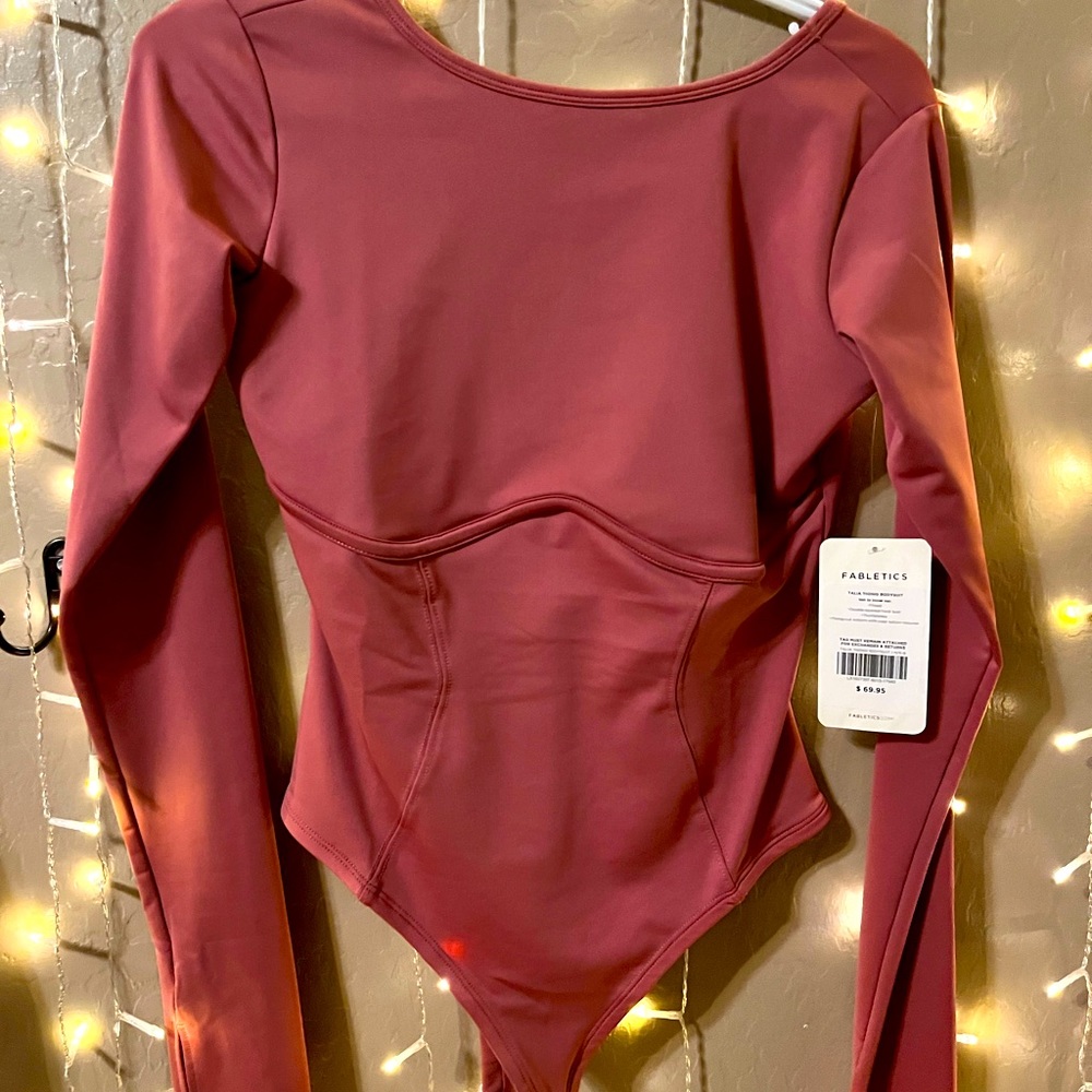 Brand new w tags. Thong bodysuit.